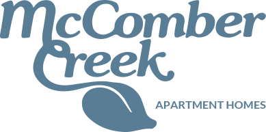 McComber Creek Apartment Homes logo